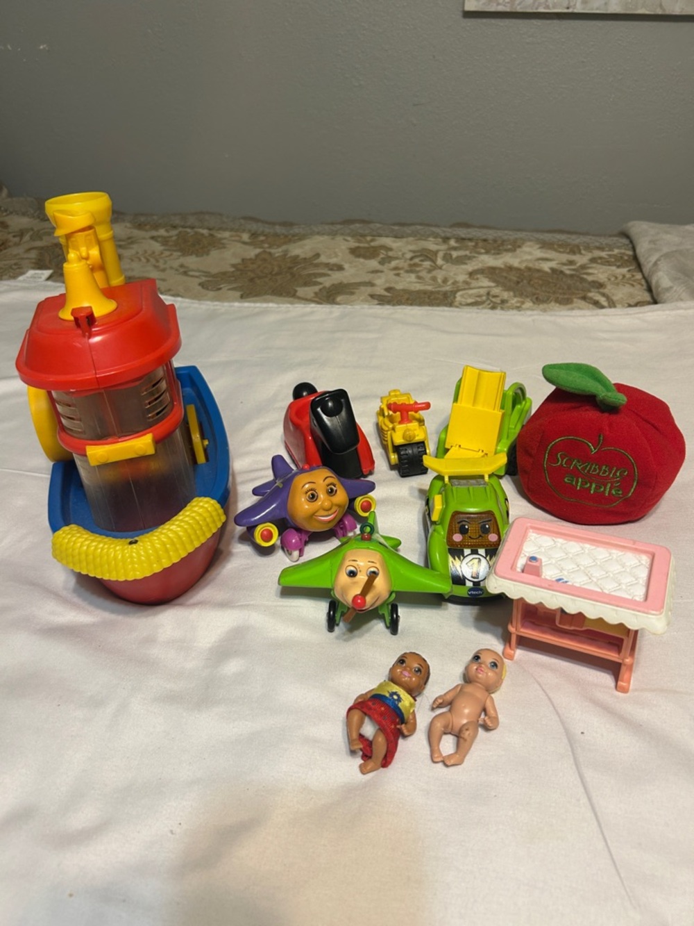 Variety toy lot: Ideal 1974 whistle tugboat, jay jay helicopter, fisher price